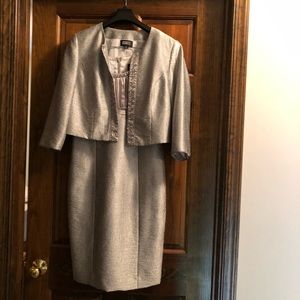 Silver sleeveless dress with jacket.